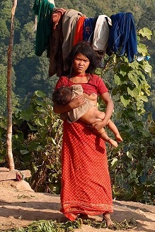 Молодая мать из племени чепанг.